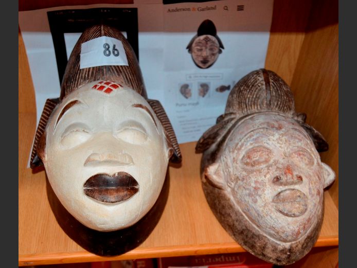 PAIR CARVED GABONESE MASKS