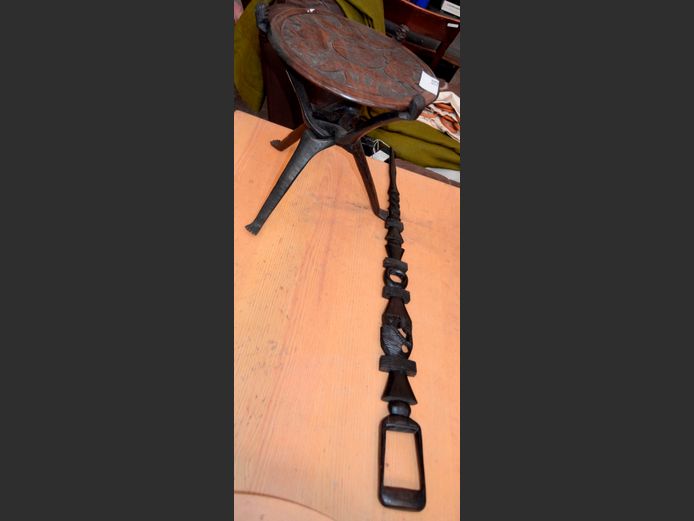 CARVED AFRICAN CIRCULAR SIDE TABLE, 35cm Diameter x 39cm High & A DECORATIVE WALKING STICK, 94cm Long [One part of handle needs to be glued]