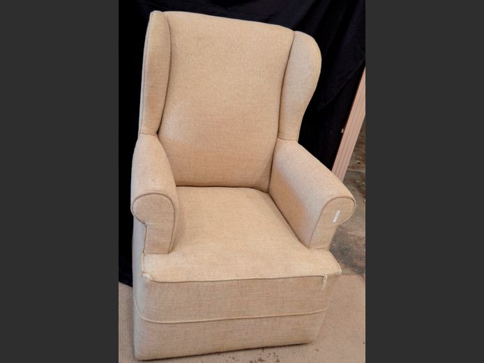 BEIGE UPHOLSTERED WINGBACK ARMCHAIR [Cat scratches]