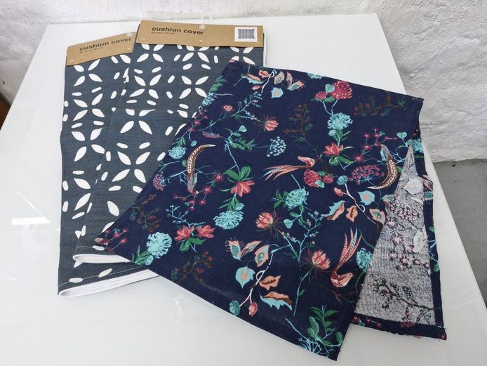 Set of Patterned Cushion Covers and Floral Table Runner