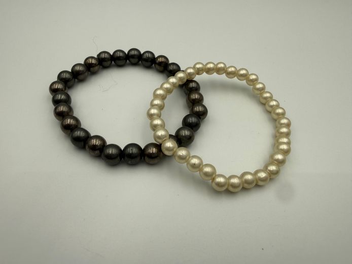 Two sets of pearl bracelets