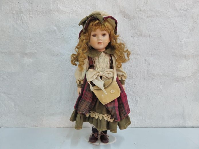 Collectible Porcelain Doll in Plaid and Green Dress