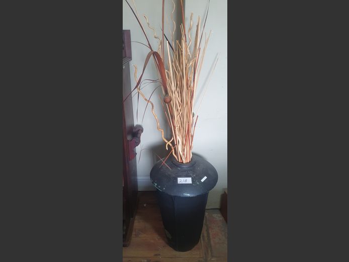 BLACK PAINTED CONCRETE VASE WITH DECORATIVE STICKS