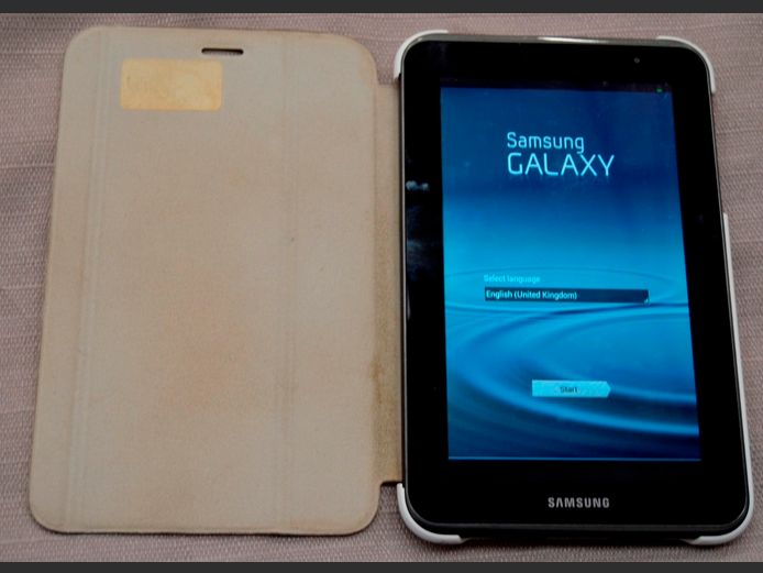 SAMSUNG GALAXY TAB 2 WITH COVER [Switches on, no charger]