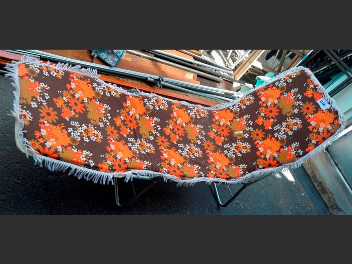 METAL FOLDING SUN LOUNGER WITH FLORAL CUSHION
