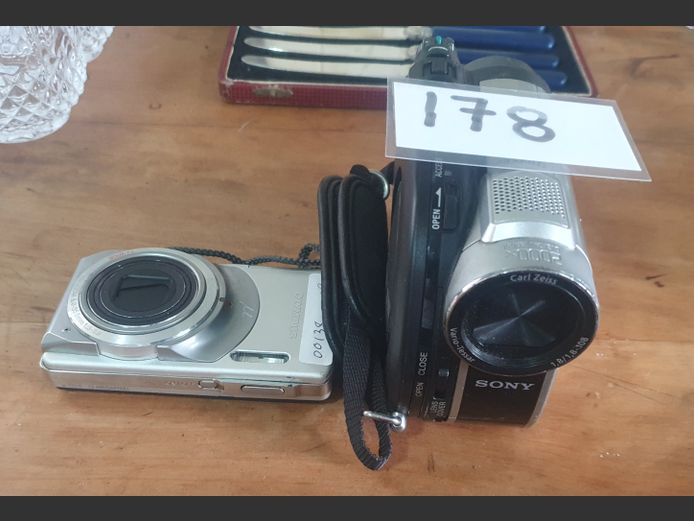 LOT: OLYMPUS DIGITAL CAMERA & A SONY HANDYCAM [Untested]