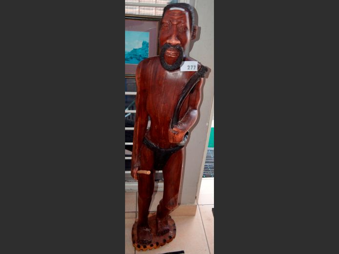 CARVED FIGURE OF AN AFRICAN MAN, 130cm High