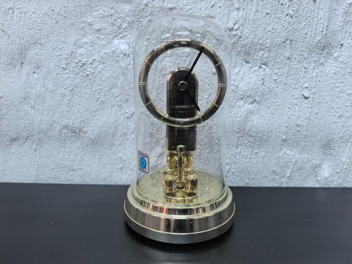 Vintage Rhythm Gold-Tone Skeleton Clock under Glass Dome