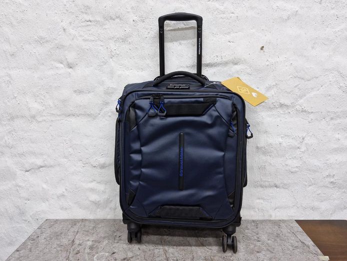 Travel Mate Navy Blue Expandable Four-Wheel Carry-On Spinner Luggage (Brand New)