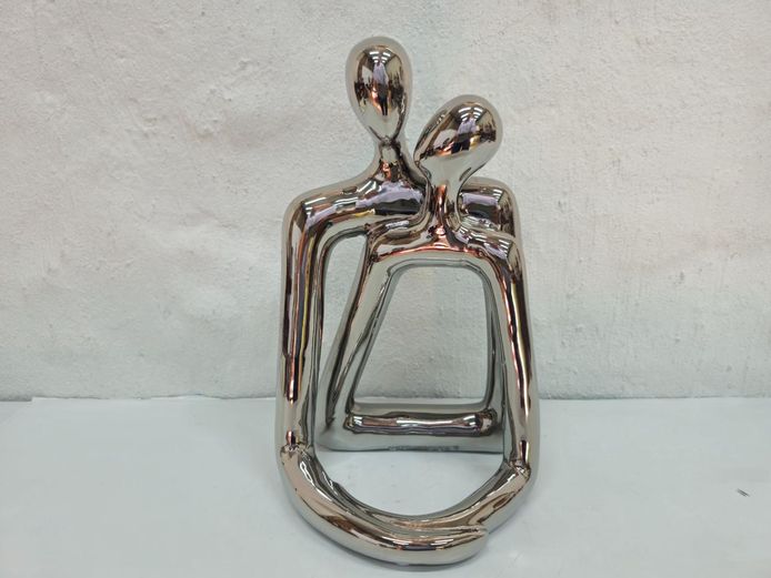 Chromed Metal Abstract Embracing Couple Figurine