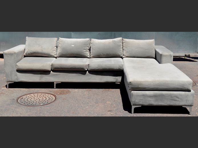 GREY UPHOLSTERED L-SHAPED LOUNGE SUITE, 305 x 200cm [Small burn mark to L section] [#: 423572406]