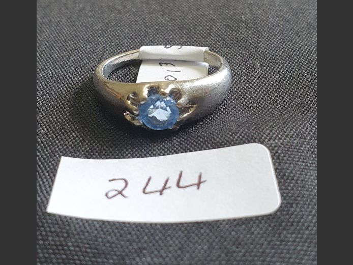 SILVER PLATE DRESS RING WITH LIGHT BLUE STONE