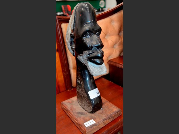 SOAPSTONE BUST OF AN AFRICAN MAN, 55cm High