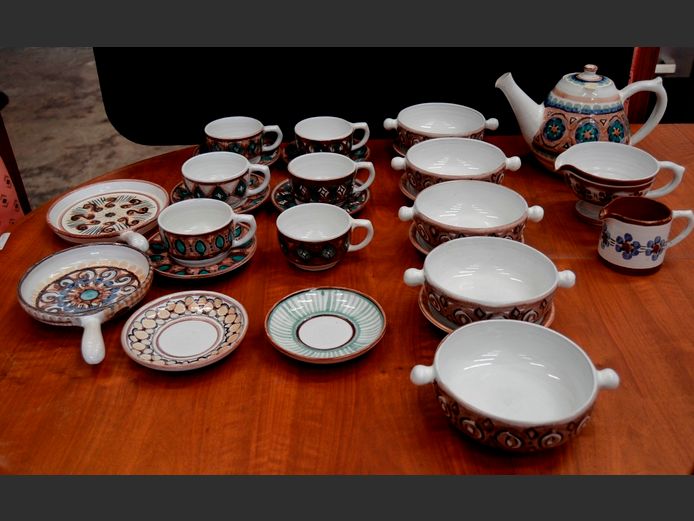 MULTI-COLOURED STONEWARE: CUPS, SOUP BOWLS, TEAPOT, CREAMER, etc  [28 Pieces]