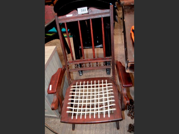 ANTIQUE MAHOGANY ARMCHAIR WITH RIEMPIE SEAT