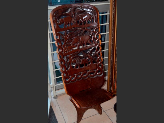 CARVED AFRICAN CHAIR