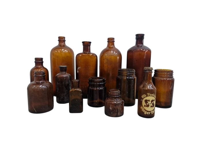 Vintage Embossed Amber Glass Bottle Collection