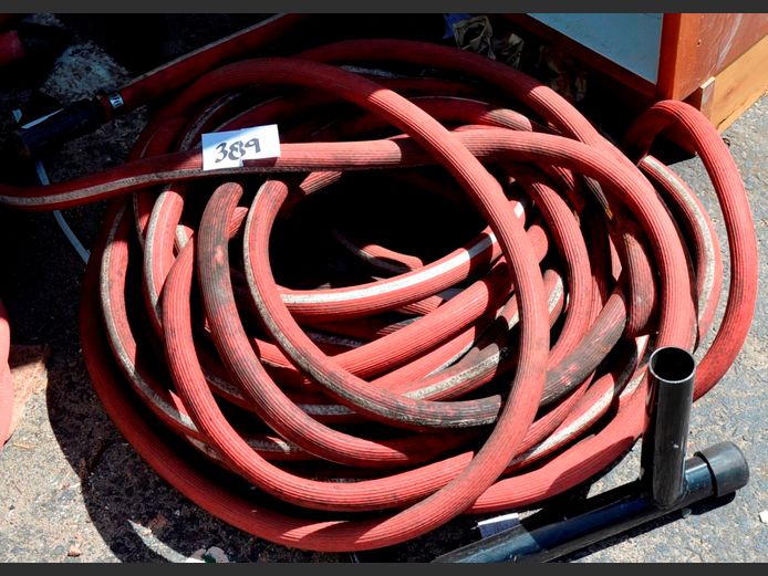 RED FIRE HOSE WITH NOZZLE