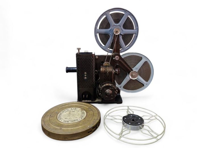 Vintage Movie Projector with Charlie Chapman Film Reel