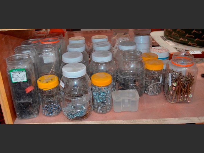 LOT: PLASTIC STORAGE BOTTLES WITH ASSORTED SCREWS, etc