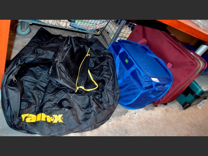INFLATABLE TUBE [Condition unknown], SUITCASE & A LAUNDRY BAG