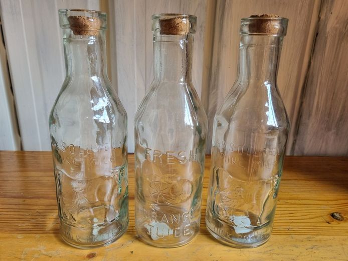 Set of 3 Vintage-Style Embossed Glass Bottles with Cork Stoppers