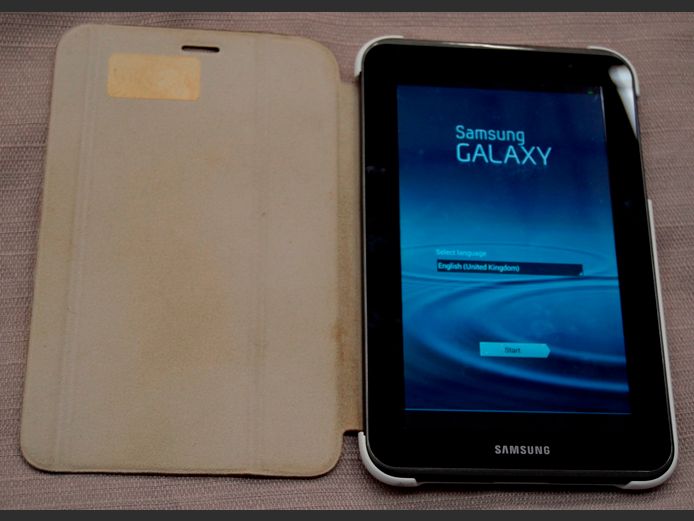SAMSUNG GALAXY TAB 2 WITH COVER [Switches on, no charger]