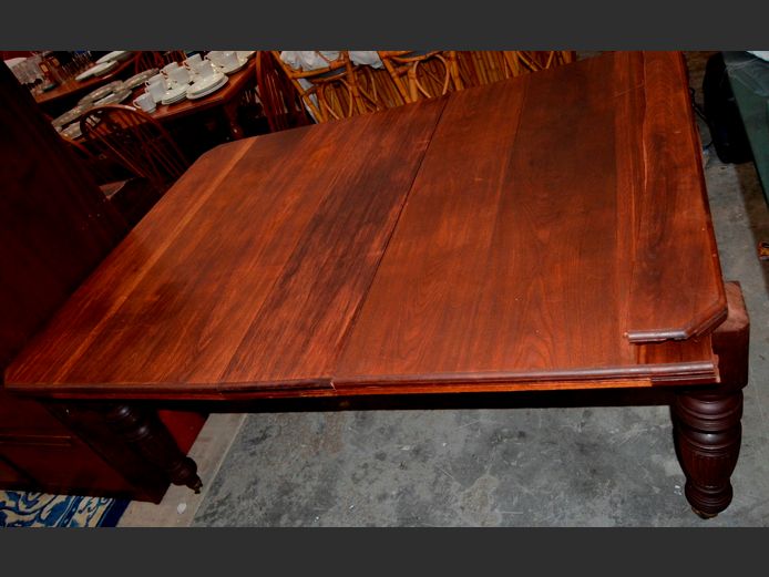 OAK EXTENSION DINING TABLE ON BRASS CASTORS, 175 x 120 x 69cm [Side damaged]