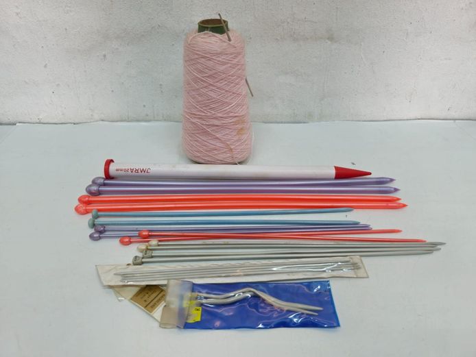 Assorted Knitting Needles and Yarn Cone