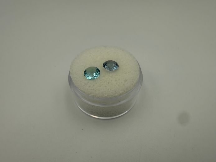 2 aqua greenish stones