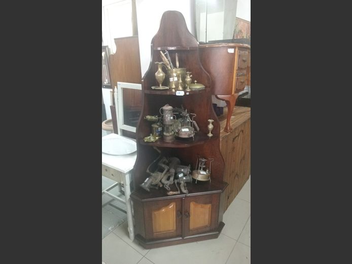 Corner cupboard contents not included