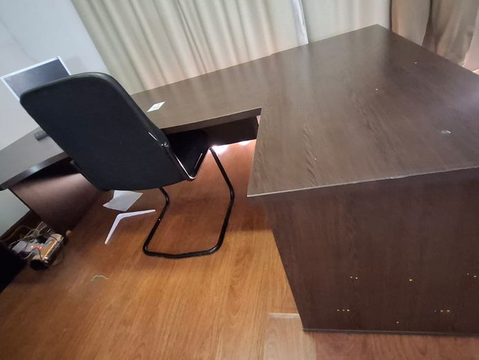 Office desk with credenza, chair, monitor and keyboard