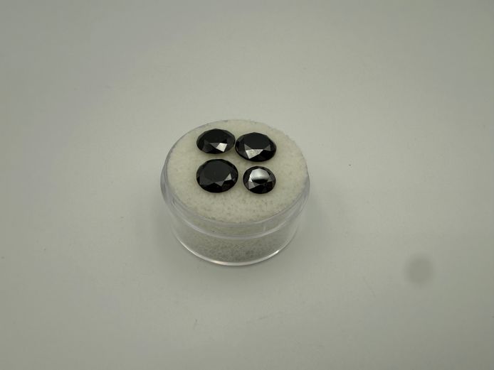 Set of 4 black stones