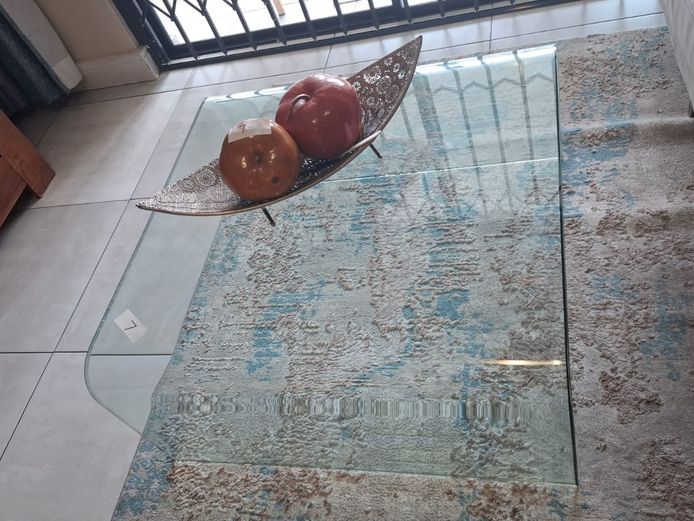 Glass coffee table and ornaments