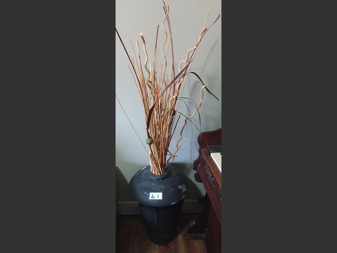BLACK PAINTED CONCRETE VASE WITH DECORATIVE STICKS