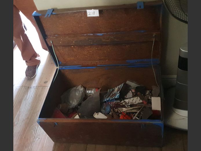 BLUE METAL TRUNK WITH CONTENTS [Rusted]