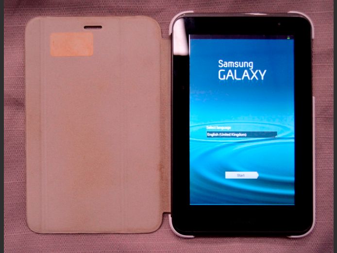 SAMSUNG GALAXY TAB 2 WITH COVER [Switches on, no charger]