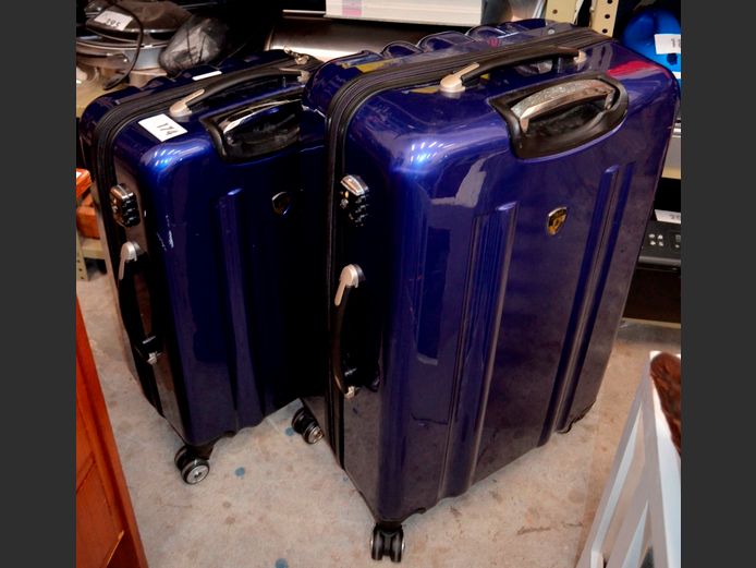 SET OF 2 HEYS BLUE HARD SHELL WHEELIE SUITCASES