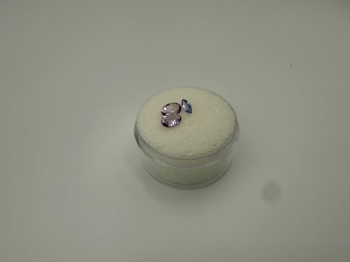 Matching pair of Amethysts and small Topaz