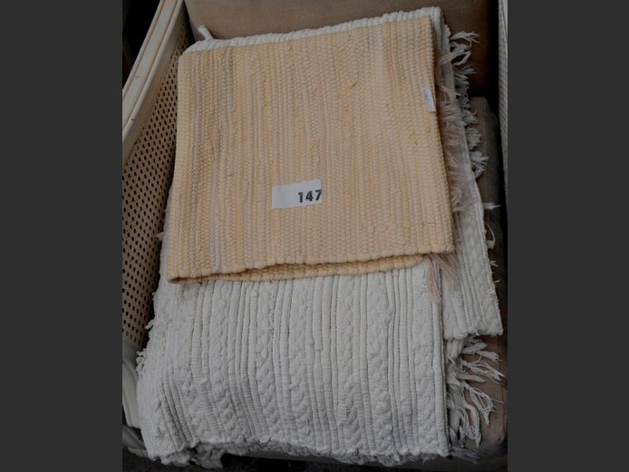 WHITE WOVEN CARPET & A BEIGE RUG