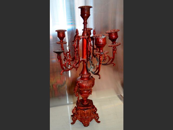 RED METAL 6-ARM CANDELABRA, 47cm High [Some losses]