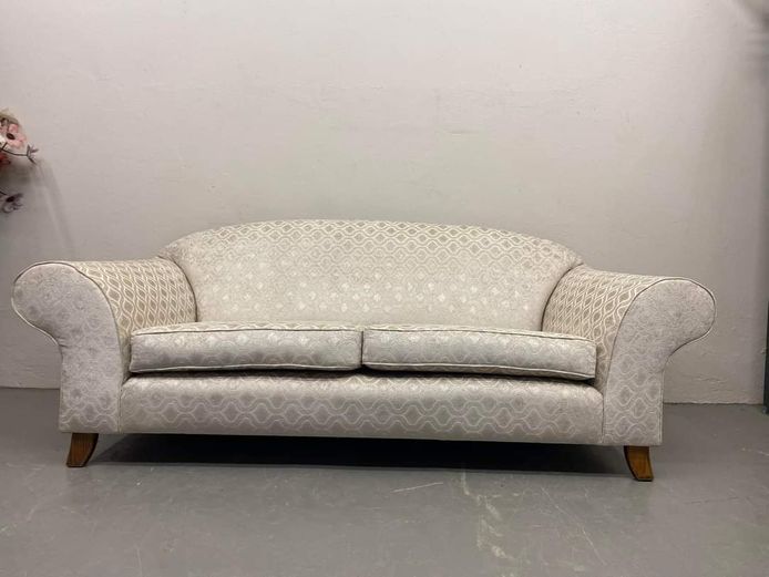 Two seater beige couch