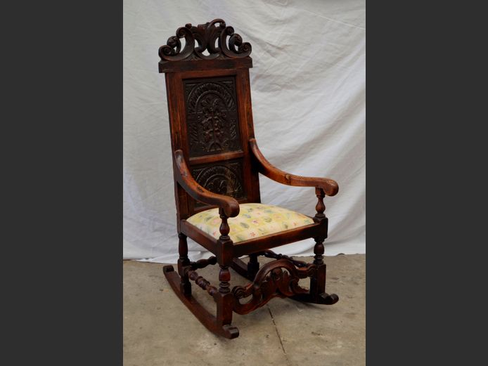 EARLY VICTORIAN TUDOR REVIVAL CARVED OAK ROCKING CHAIR