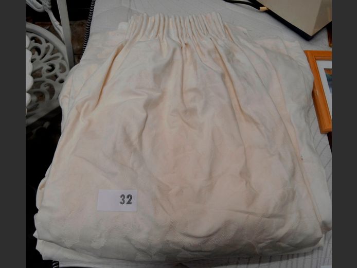 PAIR CREAM LINED CURTAINS