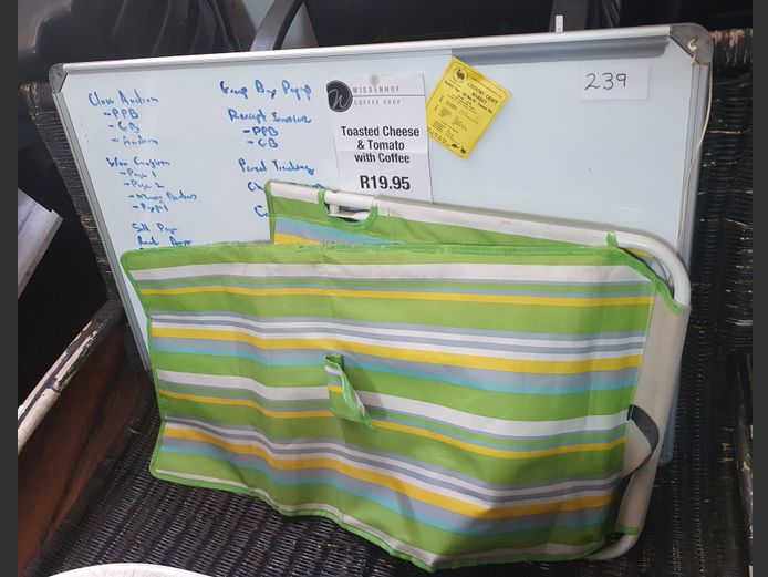 LOT: WHITE BOARD & A BEACH CHAIR