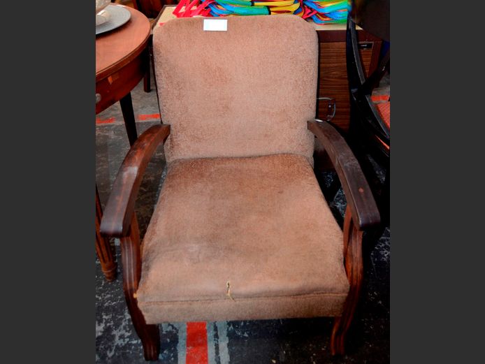 BROWN UPHOLSTERED ARMCHAIR [Seat torn & sunken]