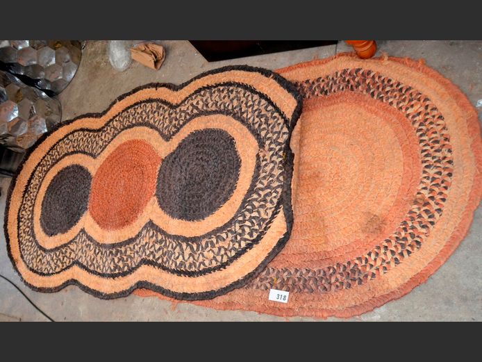 LOT: 2 x TONES OF BROWN OVAL WOVEN SEAGRASS CARPETS, 165 x 94cm & 192 x 110cm