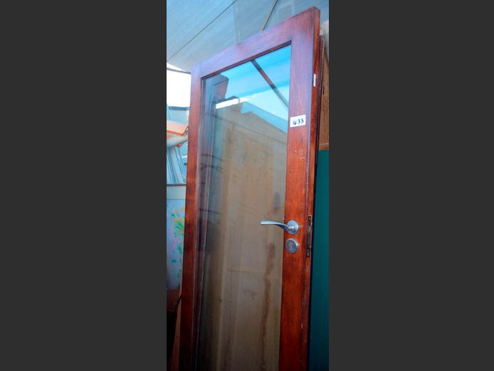 PAIR MERANTI & GLASS FRENCH DOORS