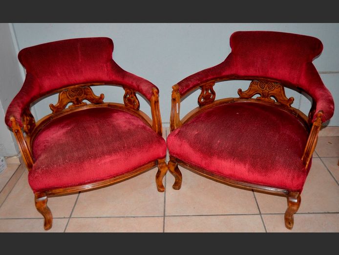 PAIR ANTIQUE UPHOLSTERED LOW BACK ARMCHAIRS