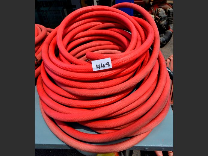 RED FIRE HOSE WITH NOZZLE